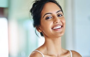 a woman smiling at the camera