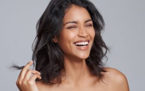 Young woman with beautiful smile and fabulous skin